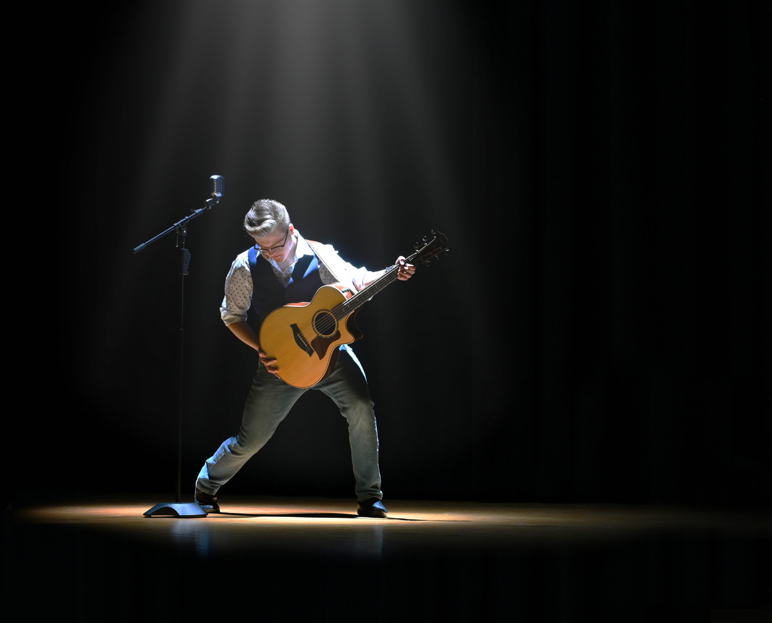 Ethan Hopper performing on stage